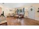 Bright living room boasts hardwood floors and is filled with plenty of sunlight at 514 Land O Lakes Ct, Deland, FL 32724