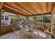 Spacious screened-in patio with chairs, table, and bicycles at 514 Land O Lakes Ct, Deland, FL 32724
