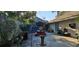 Backyard area featuring a picnic table, plants, and garden decor at 520 Dixson St, Orange City, FL 32763