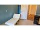 Bright room with a white chaise lounge and open doorway, offering relaxation and easy access at 520 Dixson St, Orange City, FL 32763