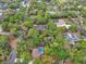Wooded neighborhood featuring homes with private pools, privacy, and mature tree coverage at 525 E Wisconsin Ave, Orange City, FL 32763