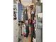 Walk-in closet with organized storage, shelving, and hanging space for clothes and accessories at 525 E Wisconsin Ave, Orange City, FL 32763