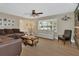Bright living room showcasing bay window, comfortable seating, and attractive decor at 525 E Wisconsin Ave, Orange City, FL 32763