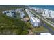 Aerial view of a beachfront condos, pool, boardwalk, and ocean views at 5300 S Atlantic Ave # 17-303, New Smyrna Beach, FL 32169