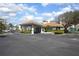 Clubhouse entrance with covered drop-off and convenient parking at 5300 S Atlantic Ave # 17-303, New Smyrna Beach, FL 32169