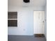Inviting condo entryway featuring a welcome mat, secure lock, and plenty of natural light at 5300 S Atlantic Ave # 17-303, New Smyrna Beach, FL 32169