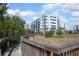Scenic condo exterior bordered by a wooden boardwalk and native landscaping at 5300 S Atlantic Ave # 17-303, New Smyrna Beach, FL 32169