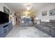 Spacious living area opens to dining and kitchen, bright with natural light at 5300 S Atlantic Ave # 17-303, New Smyrna Beach, FL 32169
