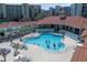 Large community pool and sundeck area at 5300 S Atlantic Ave # 17-303, New Smyrna Beach, FL 32169