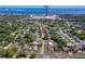 Aerial view showcasing the property's location near Suneshine Plaza, with waterfront scenery in the distance at 538 Gertrude Ln, South Daytona, FL 32119