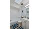 Charming bathroom with bathtub, shower, vanity and updated lighting at 538 Gertrude Ln, South Daytona, FL 32119