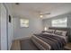 Cozy bedroom with natural light, tiled floors, ceiling fan, and ample space at 538 Gertrude Ln, South Daytona, FL 32119