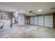 Large two car garage with a water heater, wash basin, and plenty of storage at 538 Gertrude Ln, South Daytona, FL 32119