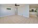 Open-concept space seamlessly connects the living area to the kitchen, enhancing the flow and functionality of the home at 538 Gertrude Ln, South Daytona, FL 32119