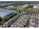 This aerial view captures a well-planned neighborhood with neatly arranged homes, streets, and lush green spaces at 544 Red Rose Ln, Sanford, FL 32771