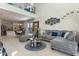 Spacious living room with modern decor, high ceilings, and open floor plan at 544 Red Rose Ln, Sanford, FL 32771