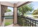 Balcony featuring decorative railing and a serene water view at 553 Quail Lake Dr, Debary, FL 32713