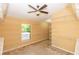 Spacious walk-in closet with extensive shelving and a window at 553 Quail Lake Dr, Debary, FL 32713