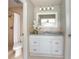 Bathroom featuring a shower, toilet, vanity, updated fixtures, and a modern design at 597 Gainsboro St, Deltona, FL 32725
