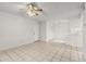 Bright living room area features tile flooring and direct access to the kitchen at 678 Wellington Station Blvd # 54, Ormond Beach, FL 32174