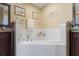Bathroom view with a stand alone soaking tub and double vanity sinks at 723 Pelican Ct, Kissimmee, FL 34759