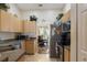 Functional kitchen with ample cabinet space and a view into the dining area at 723 Pelican Ct, Kissimmee, FL 34759