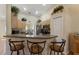 Well-organized kitchen featuring an open layout, breakfast bar seating, and lots of storage at 723 Pelican Ct, Kissimmee, FL 34759