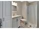Neutral bathroom with a shower-tub combo, toilet, and single sink vanity at 725 Briarcrest Dr, Orange City, FL 32763
