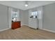 Bedroom featuring hardwood floors, bright windows, and classic furniture at 725 Briarcrest Dr, Orange City, FL 32763