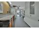 Garage featuring a workshop bench, laundry appliances, and access to outside at 725 Briarcrest Dr, Orange City, FL 32763