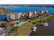 Aerial view of waterfront condominiums with a pool, boat docks and beautiful ocean views at 732 Marina Point Dr # 7320, Daytona Beach, FL 32114