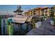 Close-up of a well-maintained boat dock area, showcasing nearby condo community and recreational boating lifestyle at 732 Marina Point Dr # 7320, Daytona Beach, FL 32114