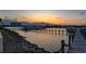Picturesque waterfront view of a dock and the tranquil water, creating a serene and relaxing setting at 732 Marina Point Dr # 7320, Daytona Beach, FL 32114