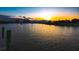 Gorgeous sunset water view overlooking the marina and boat dock, creating a picturesque and peaceful ambiance at 732 Marina Point Dr # 7320, Daytona Beach, FL 32114