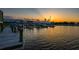 Beautiful water view of the dock at sunset, with a warm and inviting atmosphere at 732 Marina Point Dr # 7320, Daytona Beach, FL 32114