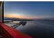 Breathtaking waterfront view from this home overlooking the marina, city, and bridge at sunset at 732 Marina Point Dr # 7320, Daytona Beach, FL 32114
