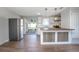 Modern kitchen with stainless steel appliances, wood floors, and a butcher block island at 852 Derbyshire Rd, Daytona Beach, FL 32117