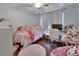 Cozy bedroom space including a soft rug, large window and comfortable furniture at 3430 Arabesque Dr, Deland, FL 32724