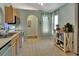 Well-lit kitchen with stainless steel appliances, a breakfast nook, and convenient storage at 3430 Arabesque Dr, Deland, FL 32724