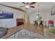 Bright and open living space featuring wood floors, elegant dining, and comfortable seating at 3430 Arabesque Dr, Deland, FL 32724