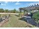 Charming patio with pergola and seating area, ideal for outdoor entertaining and relaxation at 3430 Arabesque Dr, Deland, FL 32724