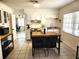 Well-lit kitchen with an island, modern appliances, and white cabinetry, offering a functional and stylish cooking space at 10 Lilac Dr, Debary, FL 32713