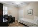 This is a cozy bedroom featuring a ceiling fan, and closet for comfortable living at 104 W Lake Victoria Cir, Deland, FL 32724