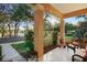 Inviting front porch offers a serene view of the lake across the street at 104 W Lake Victoria Cir, Deland, FL 32724