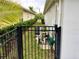 Side yard with partial view of AC, pump, and filter behind a gate at 112 Grande Lake Dr, Daytona Beach, FL 32124