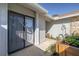Private backyard patio with sliding glass doors and a garden bed at 120 Black Duck Cir, Daytona Beach, FL 32119