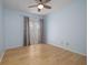 Bedroom features light blue walls and neutral flooring at 120 Black Duck Cir, Daytona Beach, FL 32119