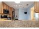 Updated kitchen featuring wood cabinets, modern appliances and a breakfast bar at 120 Black Duck Cir, Daytona Beach, FL 32119