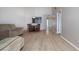Spacious living room with updated flooring, neutral paint, and dining area at 120 Black Duck Cir, Daytona Beach, FL 32119