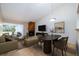 Inviting living room with a fireplace, comfortable seating, and ample natural light at 120 Black Duck Cir, Daytona Beach, FL 32119